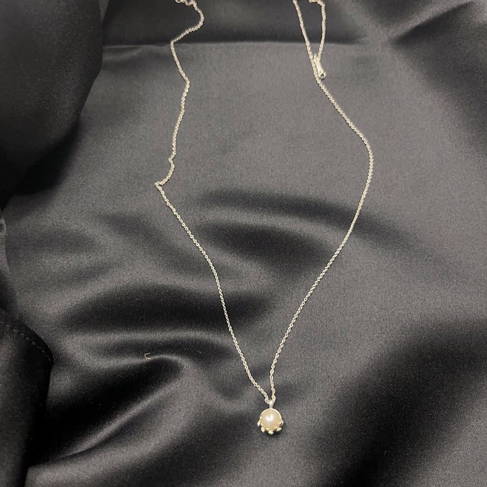 Tiffany & Co: Paloma Picasso Olive Leaf Pendant in Sterling Silver with Pearl